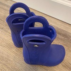 Blue CROCS rain boots for toddlers